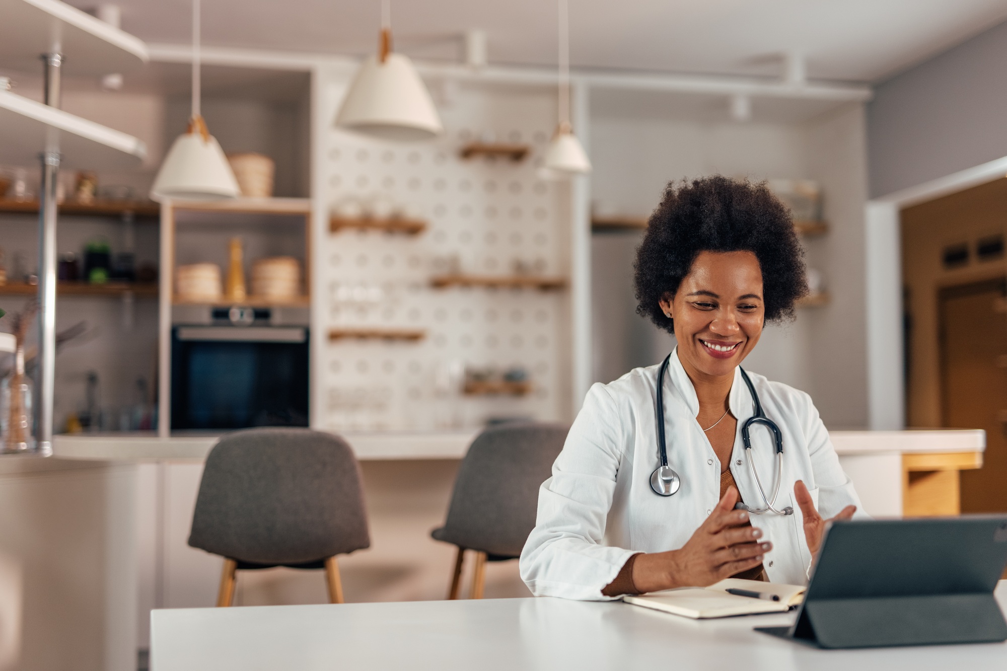 African doctor, helping her patients get well quicker.